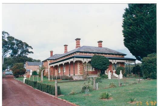 View of the front entrance and driveway of "Mount Helen" and garden