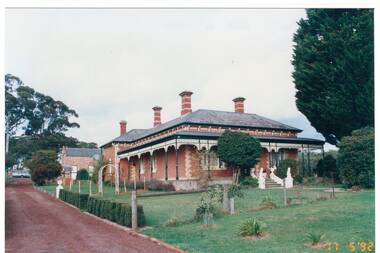 View of the front entrance and driveway of "Mount Helen" and garden