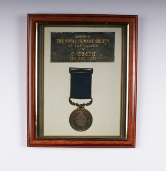 Framed Photograph of Royal Humane Society medal awarded to Cornelius Westh 18th November 1891