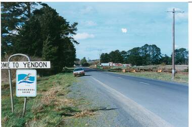 Colour photograph of main street of Yendon showing streetscape after the felling of 8-10 pine trees in the avenue by Powercor