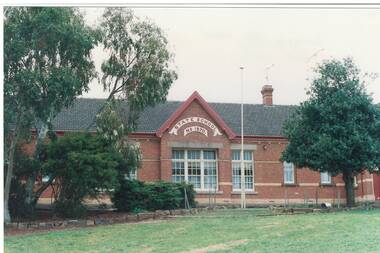 Colour photograph of Buninyong State School showing gardens and flag pole
