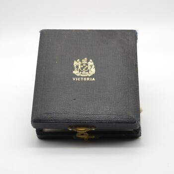 Leather bound case containing bronze medallion, given to Shire of Buninyong in 1951 to celebrate the Centenary of Victoria by State Government