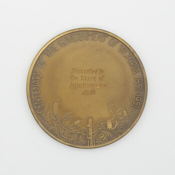 Bronze medallion (rear), given to Shire of Buninyong in 1951 to celebrate the Centenary of Victoria by State Government