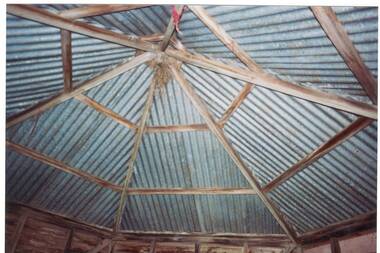 Coloured photograph showing the internal structure of the galvanized iron roof of the Yendon Primary School shelter shed taken in 1994