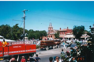 Gold King procession with fire engine and Town Hall in background