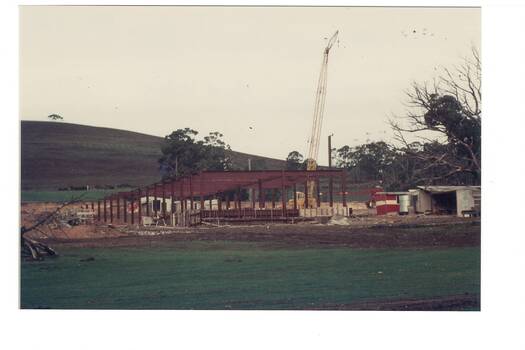 Subject depicts erection of steel framed buildings at Federation University site. Greenhill mount in the background.