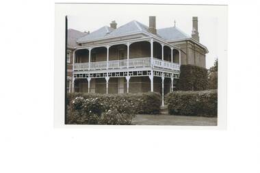Good view of the front of the building showing many details of the building style and appearance