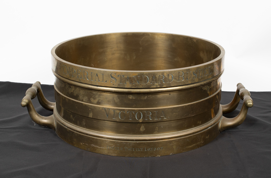 Imperial standard bushel measure, brass vessel with handles