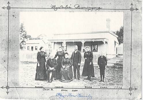 The Poynton Family outside their home, named "Syston Lea"'.