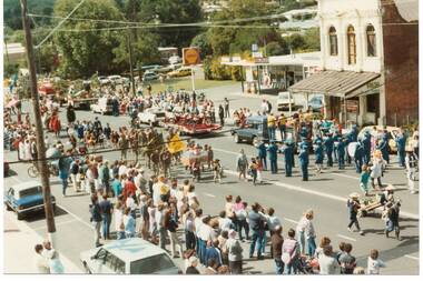 Scene shows the Festival procession passing along Warrenhiep Street toward the roundabout. 