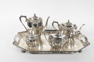 Silver tea service on tray