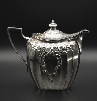 Silver milk jug