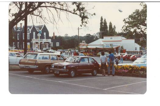 Street view of intersection in Buninyong showing Crown Hotel and commercial buildings opposite the Town Hall