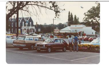 Street view of intersection in Buninyong showing Crown Hotel and commercial buildings opposite the Town Hall