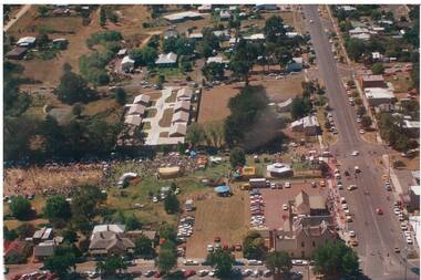 Colour photograph taken from helicopter by G. Gooding of the Gold King Festival in De Soza Park.