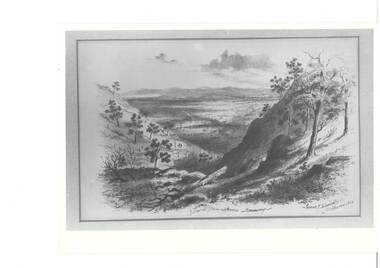 Black and white photograph of a landscape looking North from Mount Buninyong showing a lightly treed gully and the open land beyond.