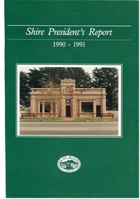 Cover of report, emerald green background, photo of old wooden library centre, tirle  in white letters, seal of Shire of Buninyong at bottom