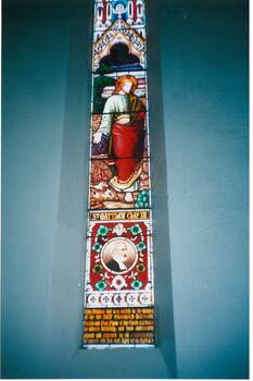Interior view of stained glass window, the upper panel illustrating St. Matthew Chap. X111 and the lower panel featuring the Rev. Thomas Hastie