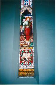 Interior view of stained glass window, the upper panel illustrating St. Matthew Chap. X111 and the lower panel featuring the Rev. Thomas Hastie