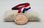 Medal with red, white and blue ribbon commemorating centenary of Buninyong W.W.I Avenue of Honour