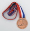 Medal with red, white and blue ribbon commemorating centenary of Buninyong W.W.I Avenue of Honour
