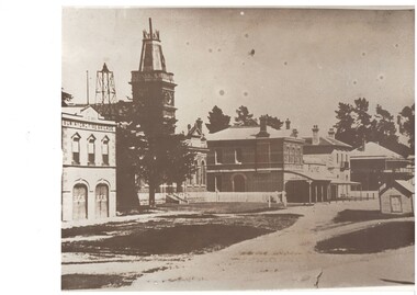 View of Buninyong Townhall Precinct showing old Fire Station, Learmonth Street shops, Buninyong Hotel and the old weighbridge circa 1887