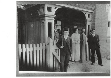 Early photograph of the Buninyong Post Office, with customers, taken in early 1900's