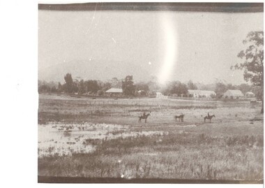 Photograph of Scott Family property Mt Boninyong showing farm buildings, types of fencing and three horses and riders c1870s