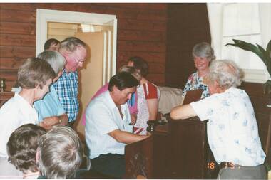 A colour photograph of some of the audience inside Scotsburn Union Church listening to the Organ Festival Performance 1997