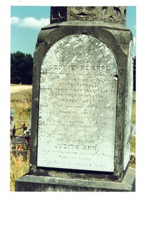 Colour photograph of gravestone of Geddie Pearse the first Headmaster of Buninyong State School and his wife Judith