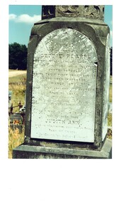 Colour photograph of gravestone of Geddie Pearse the first Headmaster of Buninyong State School and his wife Judith