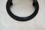 A raised inscription on the lower side of the top ring that reads "15".
