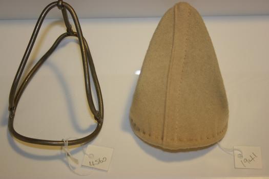 Murray's chloroform mask is a moulded wire mask, with a hinged arm allowing it to be folded flat. Pictured on the left without a covering, and pictured on the right with a gauze covering, designed to protect the patient's face.
