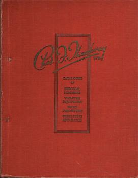 Red hard cover book with gilded lettering for its name.