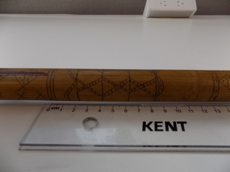 The engravings along the blowpipe are used for a variety of cultural purposes including helping to identify the correct plants to use when making the poison used in hunting.