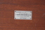A small. rectangular, metal manufacturer's plaque is affixed to the rear of the box. The plaque reveals the machine to have been made by The Edison Swan Company of Charing Cross Road, London.