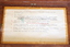 Affixed to the inside lid of the wooden box is a typed instruction sheet with seven steps for the practitioner to follow.
