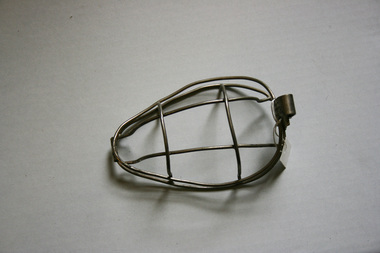 An oval shaped face mask with interconnected wire strips which make a dome for placing over the nose and mouth.