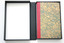 Clover's casebook is stored in a custom case