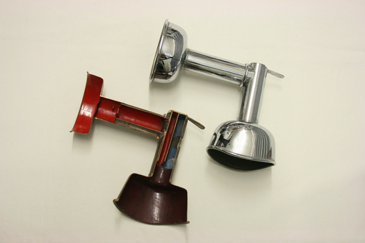 Two Parrett's somnoform inhalers. One has been sectioned to reveal the interior.