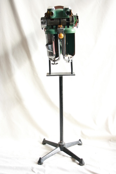 The main body of the Coxeter-Mushin carbon dioxide absorber affixed to a stand.
