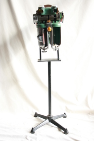 The main body of the Coxeter-Mushin carbon dioxide absorber affixed to a stand.