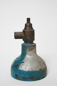 The top part of a gas cylinder with brass valve attached