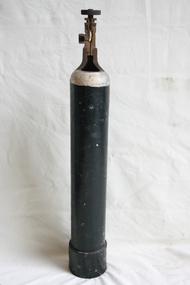 A gas cylinder with a sectioned outflow regulator valve