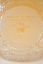 The etching on the front of the crystal bowl.