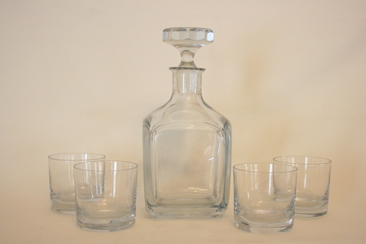 A set including a decanter and four glasses