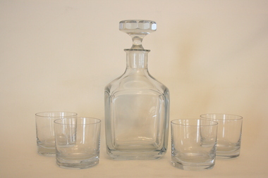 A set including a decanter and four glasses