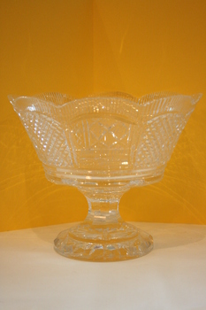 A cut Waterford crystal fruit bowl with flanged top on stamped platform base.