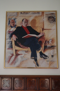An oil painting set in a simple gold frame.