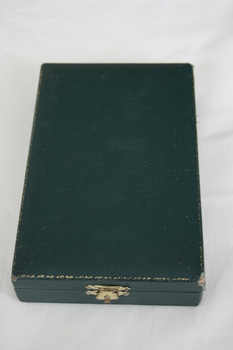 The protective box that the President's Medal is kept in.